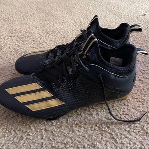 Gold and Black Adidas football cleats